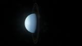 Varför ligger Uranus på sidan?
