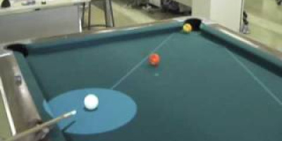 En robot som spelar biljard