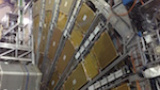 Har man upptäckt Higgs boson?